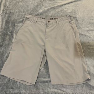 Mens flat front athletic material Adidas golf shorts in stone size 32
